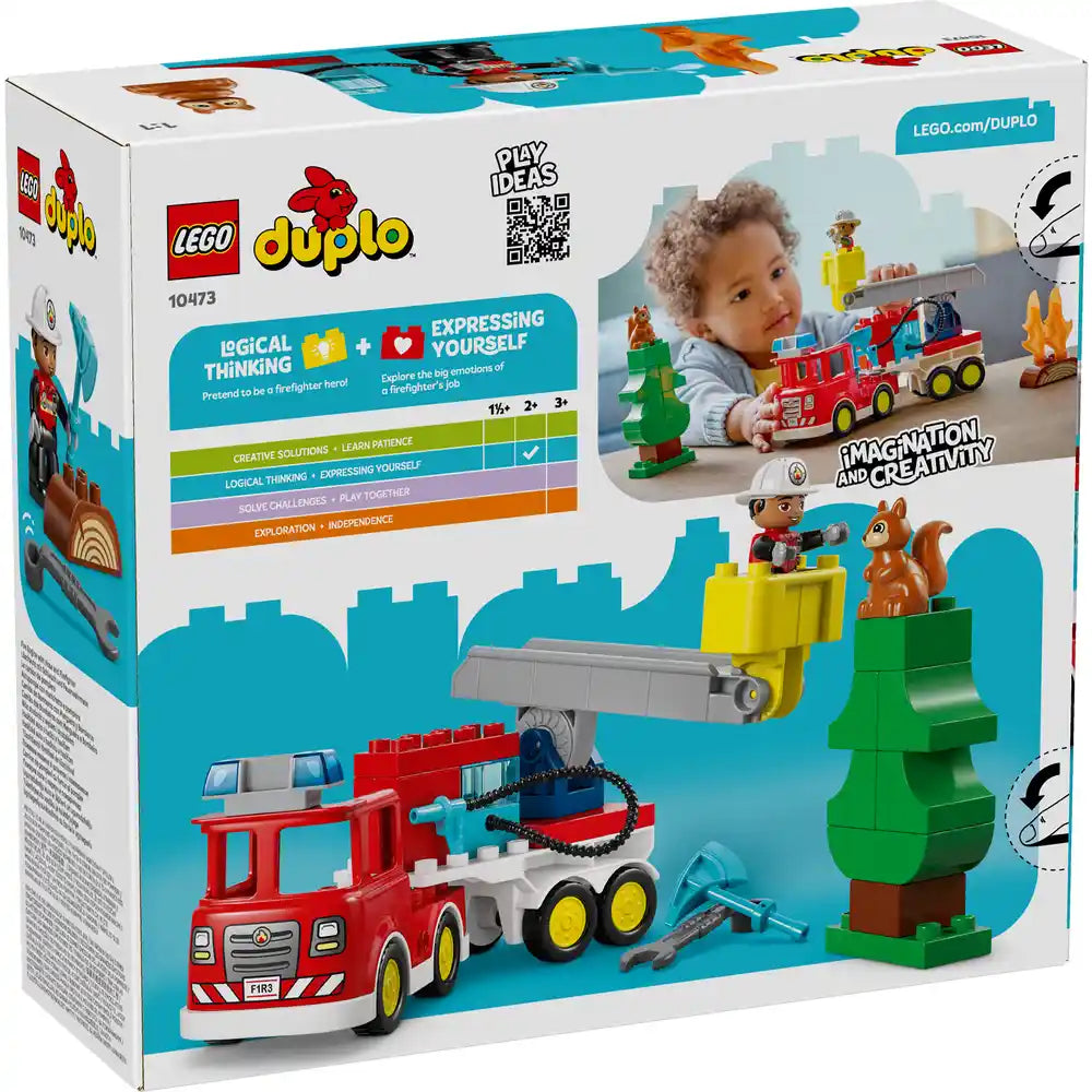 LEGO DUPLO Fire Truck Rescue Set 10473 featuring red fire truck with yellow wheels, extendable ladder, firefighter minifigure, brown dog, green tree, and blue packaging displayed against white background