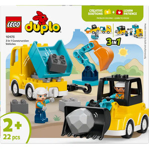 LEGO Duplo 10475 3 in 1 Construction Vehicles set with yellow and black bulldozer, yellow and turquoise excavator, and yellow dump truck on sandy construction site background, featuring two minifigures and 22 colorful LEGO bricks, designed for ages 2 and up