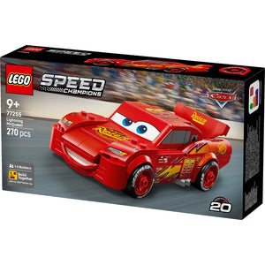 LEGO Speed Champions 77255 Lightning McQueen set featuring a red buildable race car with yellow lightning bolt design and blue eyes, displayed in packaging showing 270 pieces and age 9+ recommendation
