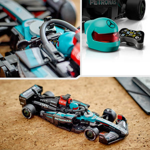 LEGO Mercedes-AMG F1 W15 Race Car set 77244 showing turquoise and black Formula 1 car model with steering wheel detail, turquoise racing helmet with red visor, black remote control handset, and fully assembled car on cork surface alongside individual components