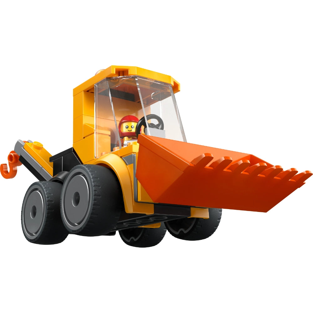 LEGO construction loader toy with yellow and orange plastic body, orange front bucket/scoop, large black tires, transparent cabin with yellow minifigure driver wearing red hard hat, steering wheel visible through windshield, on white background
