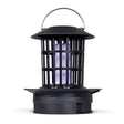 Black cylindrical electric insect killer with grid design, purple UV light tubes visible inside, metal carrying handle on top, and wide base, isolated on white background