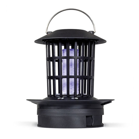 Black cylindrical electric insect killer with grid design, purple UV light tubes visible inside, metal carrying handle on top, and wide base, isolated on white background