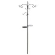 Black metal bird feeding station with ornamental scrolled top and curved hooks, featuring two circular feeding trays at mid-height, garden style pole design
