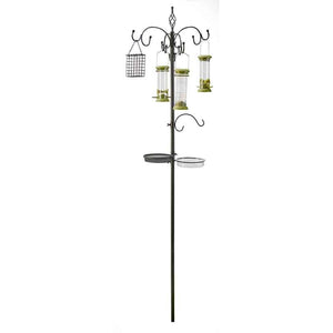 Black metal bird feeding station with multiple hanging feeders, wire mesh suet cage, and two circular trays on curved arms, featuring green accents on feeder tops and a tall central pole