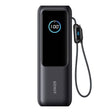 Anker 25000mAh 165W power bank in dark grey with built-in USB-C cable, digital display showing 100% charge level, and braided charging cable attached