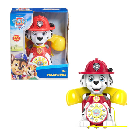 Paw Patrol toy figure with red helmet and yellow arms next to its packaging