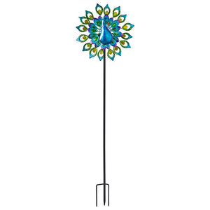Decorative peacock solar wind spinner with vibrant blue and green feathered design, yellow accents, long black metal stake pole for garden display