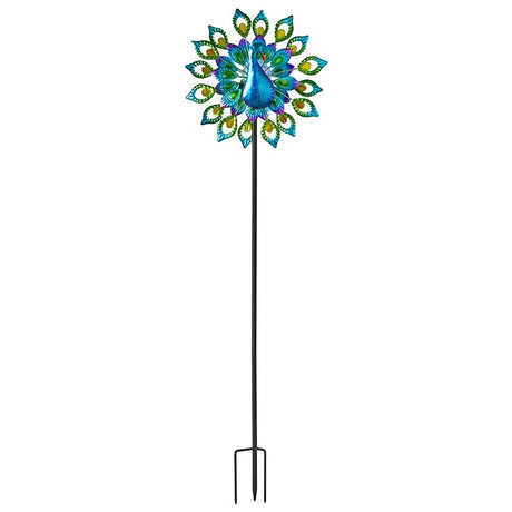 Decorative peacock solar wind spinner with vibrant blue and green feathered design, yellow accents, long black metal stake pole for garden display