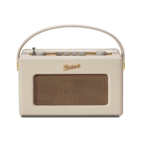 Roberts Revival FM/DAB portable radio in cream with gold accents, featuring a carrying handle, mesh speaker grille, and control buttons on top