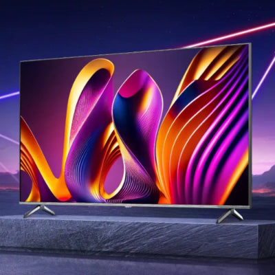 Modern TV with colorful abstract design on screen against a dark background