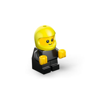 LEGO minifigure with bright yellow helmet and head, smiling face with black eyes, yellow hands, and black torso and legs against white background