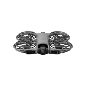 DJI Neo 2 compact drone with four black propeller guards and central camera, gray body shown from front view against white background