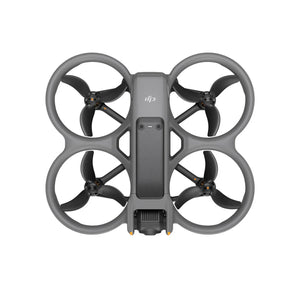DJI Avata 2 FPV drone shown from above with gray propeller guards, four black propellers, central gray body with control buttons, and yellow accents on the landing gear against a white background