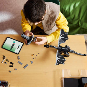 LEGO Minecraft The Ender Dragon 21595 - a child building the set. 710 pieces. Ages 10+.