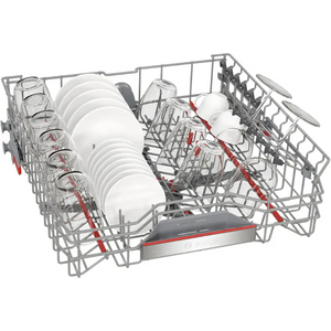 Bosch Series 6 stainless steel dishwasher open basket view showing white plates, glasses and red handled cutlery baskets with gray interior and red accent trim
