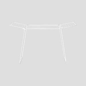 White metal clothes drying rack airer with two angled wings and four legs, front view on neutral background
