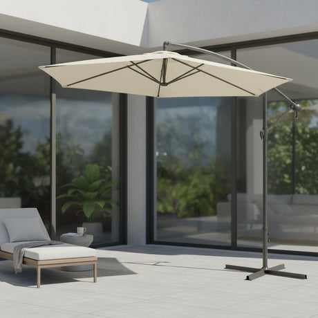 Beige Euroactive 3 metre cantilever parasol with grey metal frame on modern patio, providing shade over a wooden lounger beside contemporary glass doors and potted plants