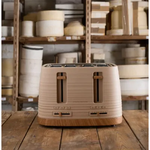 Morphy Richards Clay Felspar 4 slice toaster with cream and wood finish on wooden surface with kitchen storage shelving in background