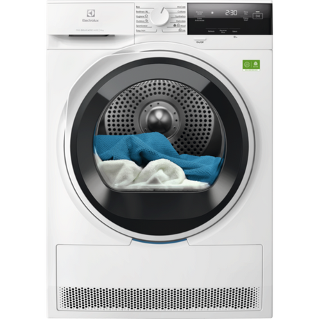 White dryer with clothes inside on a white background