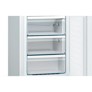Interior view of Bosch Series 2 white fridge freezer showing three transparent drawer compartments with blue trim and metal handles, displaying spacious storage capacity for frozen foods