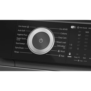 Close-up view of Bosch Series 6 washing machine control panel showing grey front-loading drum with circular chrome dial, digital display, and labeled wash cycle options including Eco, Cotton, Delicates, and Wool settings with WiFi and Iron Assist features