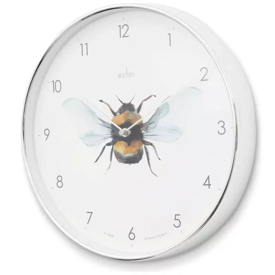 Acctim Society Bee silver analogue wall clock featuring watercolor bee illustration in center with black, yellow and blue tones, white dial face with gray numbers and hands, round silver metal frame, suitable for home decor