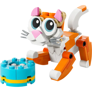 LEGO Creator 3 in 1 orange and white cat building set with pink ears and bow, featuring articulated orange limbs and joints, displayed with turquoise and yellow circular base plate component