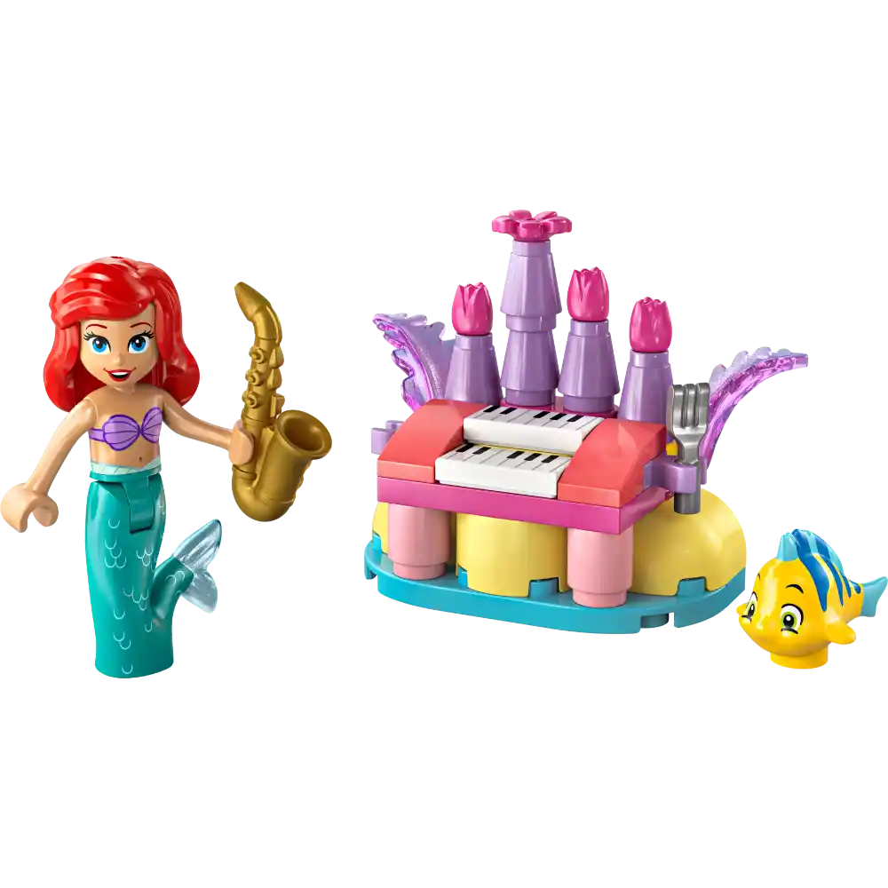 LEGO Disney Ariel and Flounder's Birthday Music Fun set featuring red-haired mermaid minifigure with purple bikini top and turquoise tail holding gold saxophone, colorful castle structure with purple towers pink details yellow base blue platform white keyboard and purple organ pipes, and yellow Flounder fish minifigure