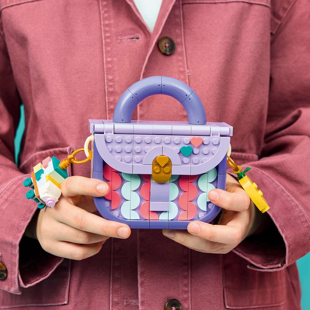 LEGO Creator Art Fashion Bag with Storage 31391 - a child playing with the finished build. 272 pieces. Ages 8+.