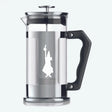 Bialetti Preziosa Pressofiltro 8 cup stainless steel coffee press with black handle and top, featuring the iconic Bialetti moka pot silhouette logo on the brushed silver body