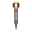 Dyson Supersonic Origin Hair Dryer in nickel and copper with perforated grip handle and circular copper air ring attachment head