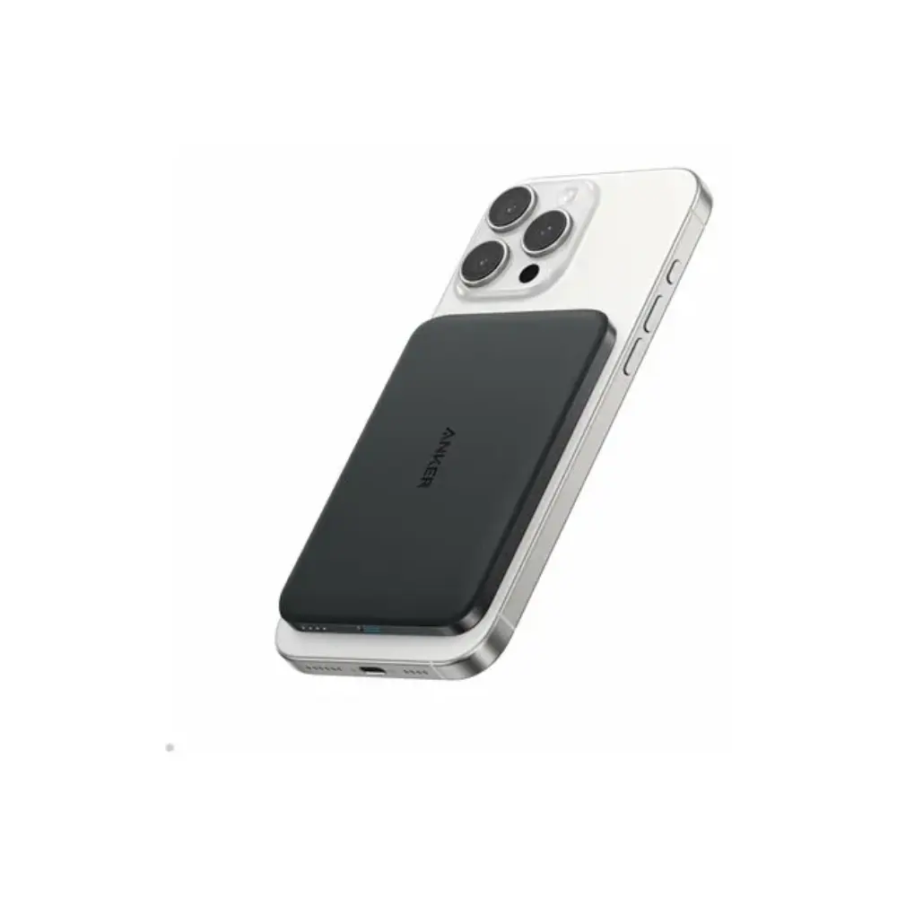 Anker Nano 5000mAh slim black power bank attached to silver iPhone 14 Pro showing triple camera setup and USB-C port