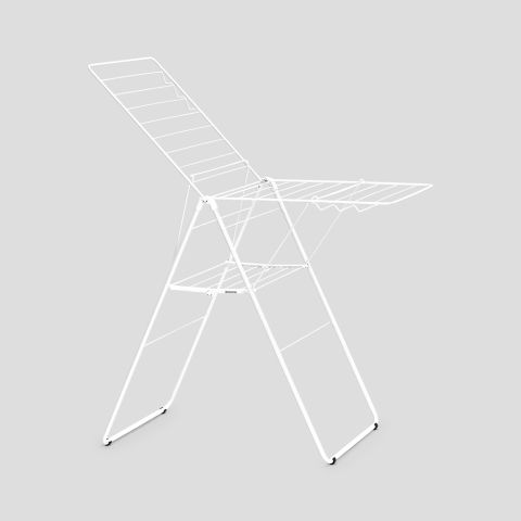 White Brabantia HangOn Winged Clothes Airer with extended drying rails shown from an angled view against a grey background