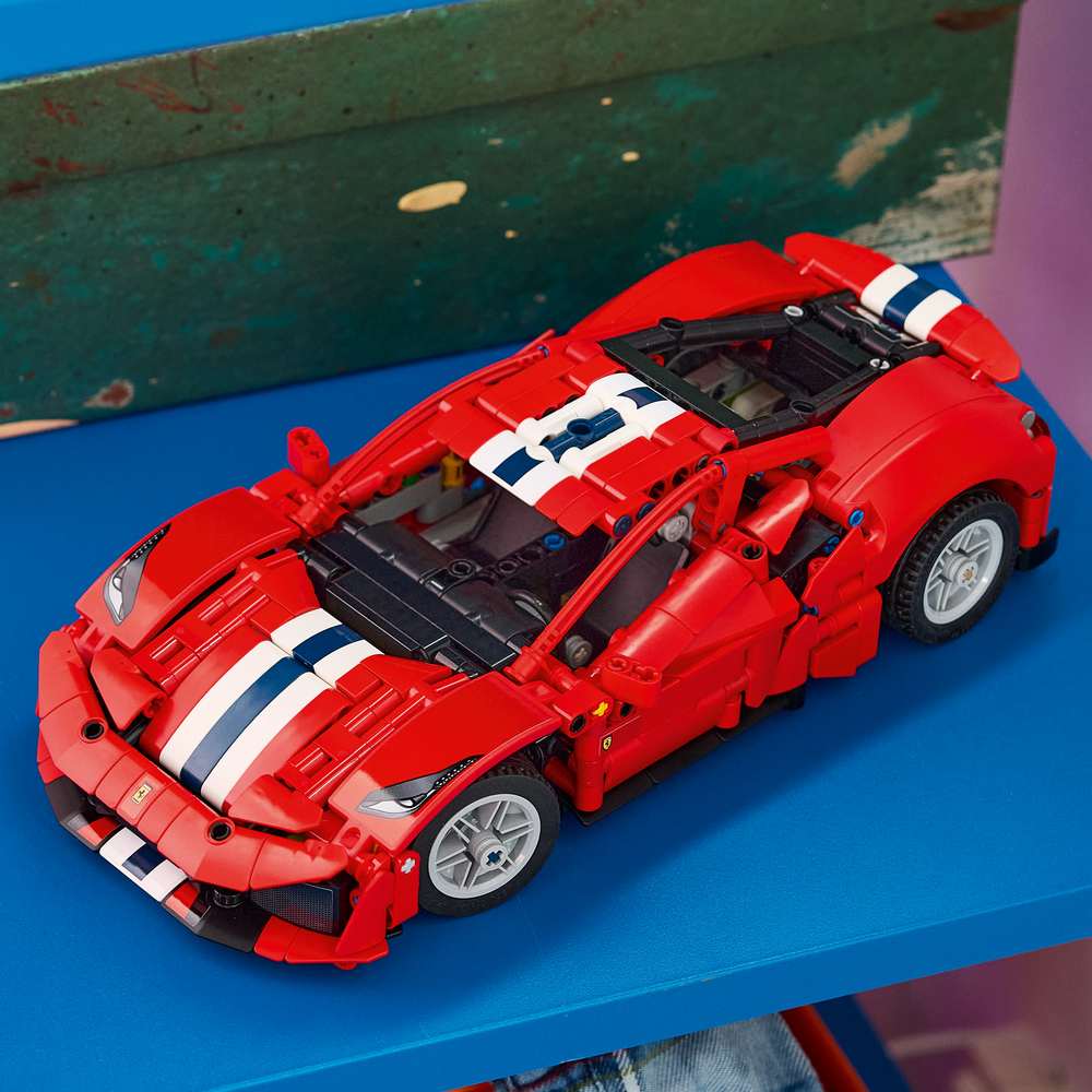 LEGO Technic Ferrari 488 Pista Car 42235 - the finished build shown in a home setting. 882 pieces. Ages 9+.