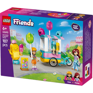 LEGO Friends Ice Cream and Balloon Stand set 42692 box showing colorful ice cream cart with pink and turquoise awning, yellow banana character, two minifigure girls, blue bicycle, and balloon stand pieces against vibrant playground background, 107 pieces for ages 6+