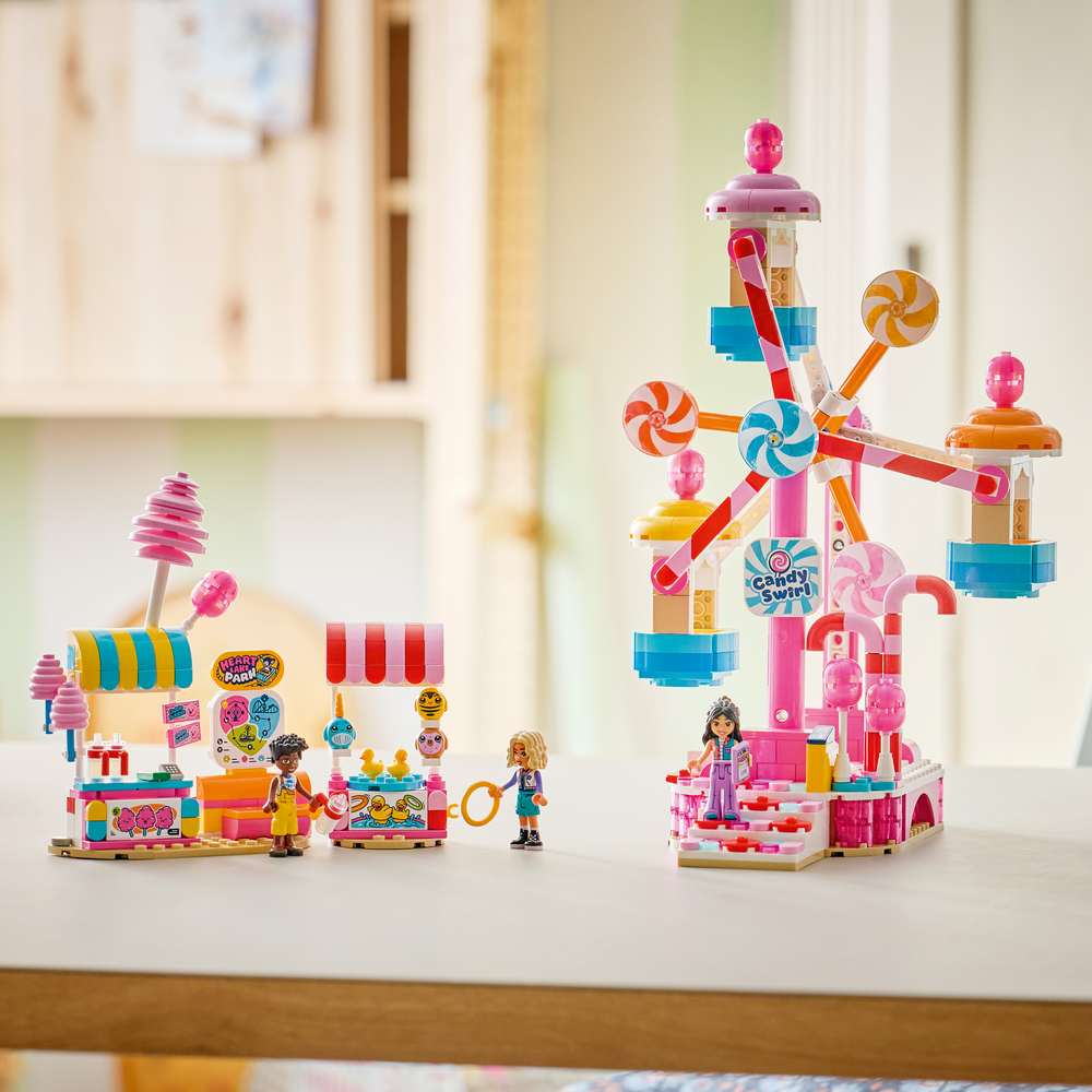 LEGO Friends Candy & Cupcake Ferris Wheel 42700 - the finished build shown in a home setting. 602 pieces. Ages 7+.