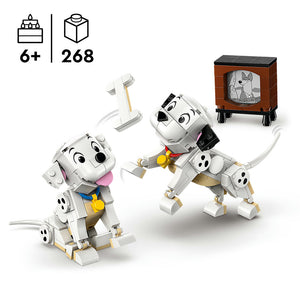 LEGO 101 Dalmatians Lucky and Penny buildable puppy figures with white and black brick construction, yellow collar details, pink tongue, accompanied by vintage television set and antenna accessories, 268 pieces, ages 6 and up