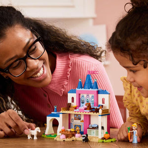 LEGO Disney Princess Cinderella Animal Friends Castle 43283 - a child playing with the finished build. 149 pieces. Ages 4+.