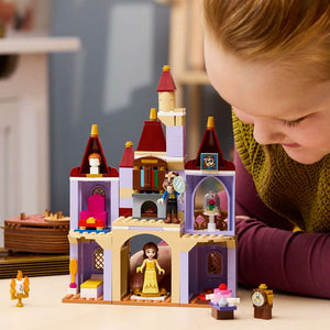 LEGO Disney Princess Belle & the Beast's Enchanted Castle 43289 - a child playing with the finished build. 254 pieces. Ages 5+.