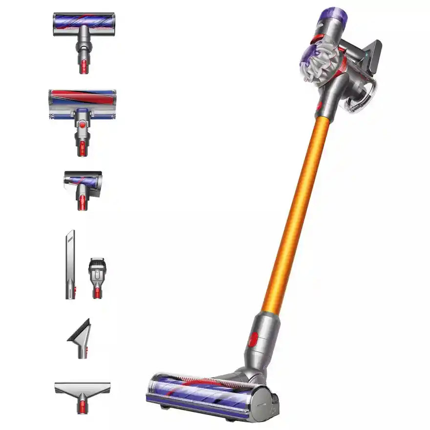 Dyson V8 Absolute cordless stick vacuum with gold telescopic pole, purple and silver motor head, and interchangeable cleaning heads including motorized brush head, crevice tool, and flat cleaning attachments displayed on left side
