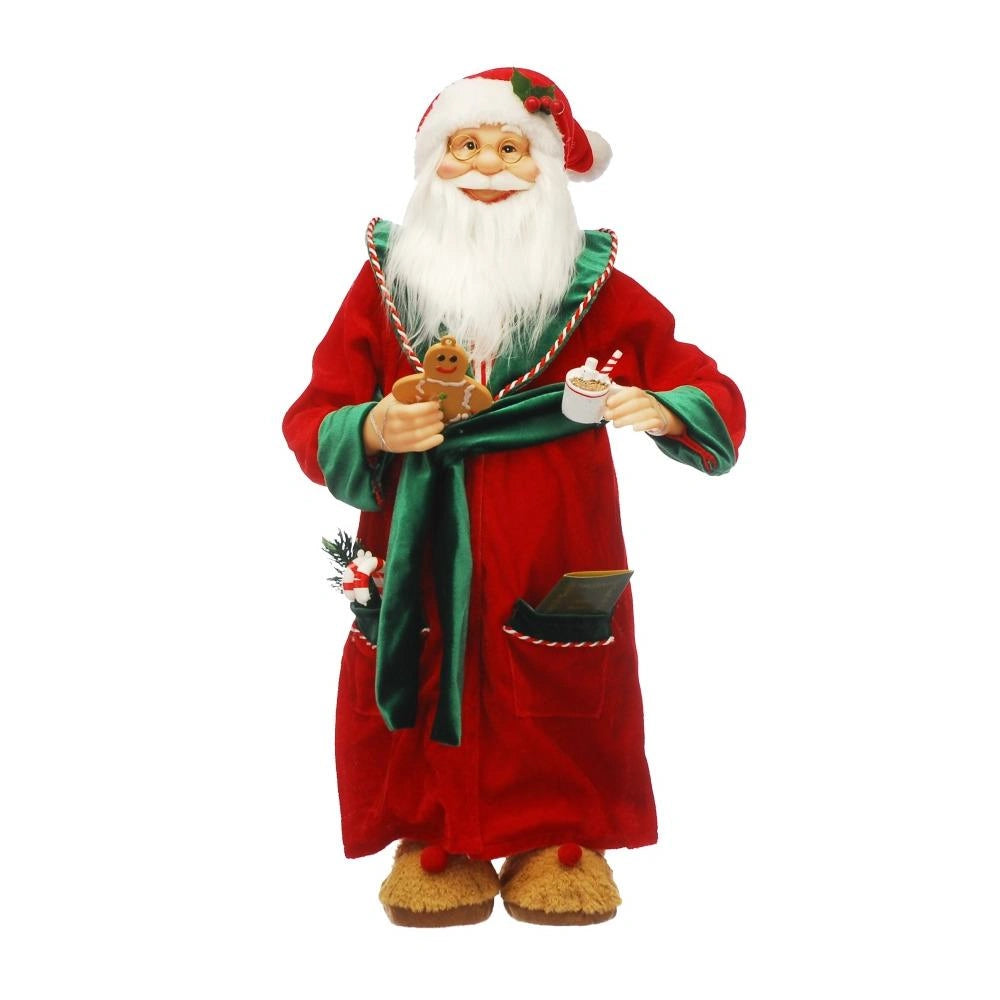 Decorative Santa Claus figure holding a cup and cookies on a white background