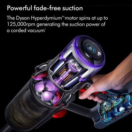 Dyson V11 Advanced cordless vacuum with Hyperdymium motor shown in cutaway view displaying purple and black design, internal motor components, battery pack, and digital display against black background