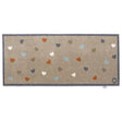 Hug Rug runner mat 65cm x 150cm with beige base and scattered heart pattern in white, cream, orange, blue, navy and grey tones, featuring dark blue border