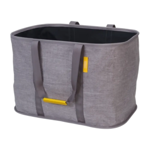 Joseph Joseph Hold All Max Laundry Basket in grey fabric with dark grey handles and yellow accents, featuring a black interior and reinforced rim