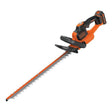 Black and Decker Powercommand 18V cordless hedge trimmer with orange and black design, featuring dual handles and serrated cutting blade