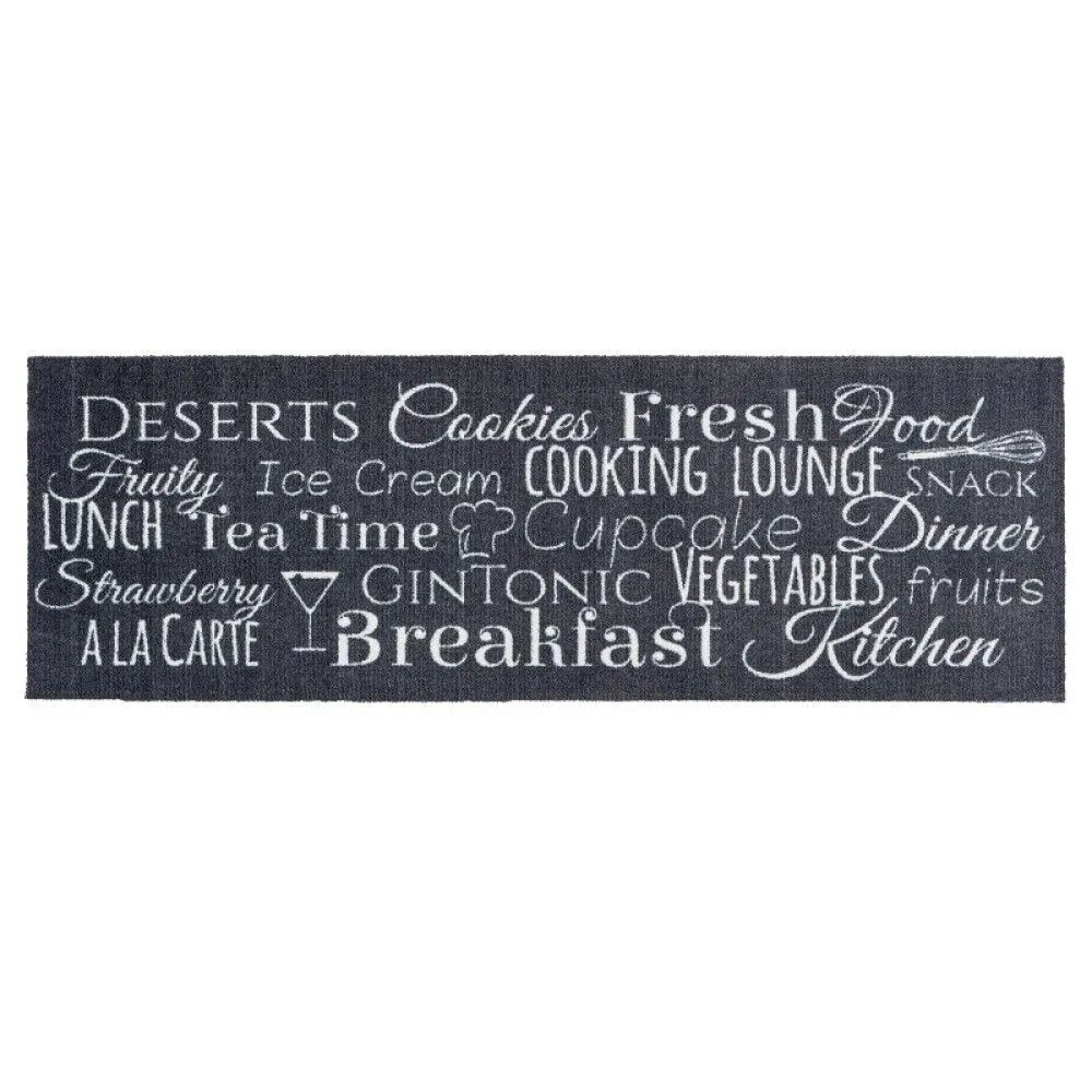 Dark grey kitchen runner mat with white scripted text featuring food and dining related words including Breakfast, Lunch, Dinner, Cookies, Ice Cream, Cupcake, Vegetables and Kitchen, measuring 50cm x 150cm