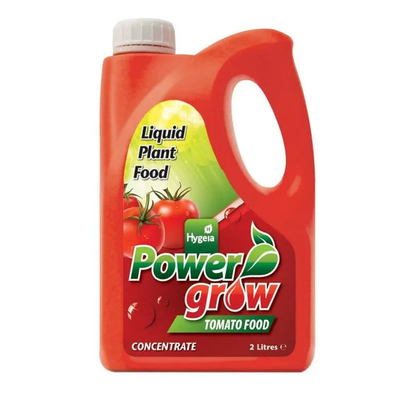 Red plastic bottle of Hygeia Powergrow Tomato Food liquid concentrate with white screw cap, yellow and green label featuring tomato imagery, 2 litre size