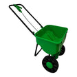 Green rotary broadcast spreader with 20 litre capacity, black pneumatic wheels and handle grips, featuring a hopper-style bucket design for garden fertilizer and seed distribution