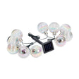 Solar-powered string lights featuring 10 iridescent opal orb bulbs with rainbow prism effect, black solar panel controller and connecting wires on white background